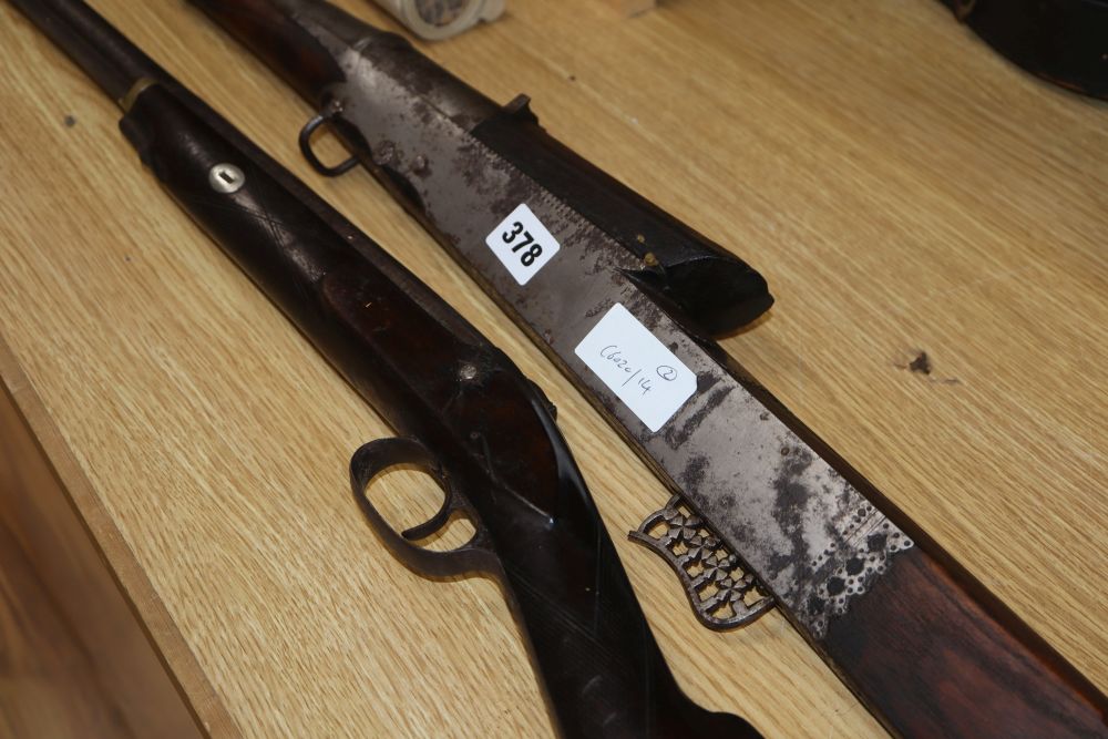 A 19th century percussion cap musket and an Eastern musket